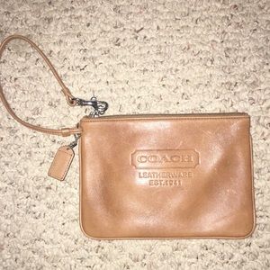 Tan coach wristlet
